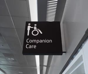 Companion care restroom sign